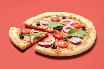 Tasty pizza with basil and tomatoes on red background