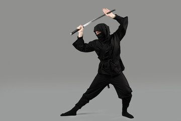 Male ninja with sword on grey background © Pixel-Shot