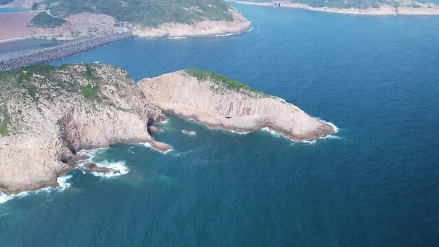 a hexagonal columns landscape in Hong Kong Geopark, at Sai Kung of Po Pin Chau island