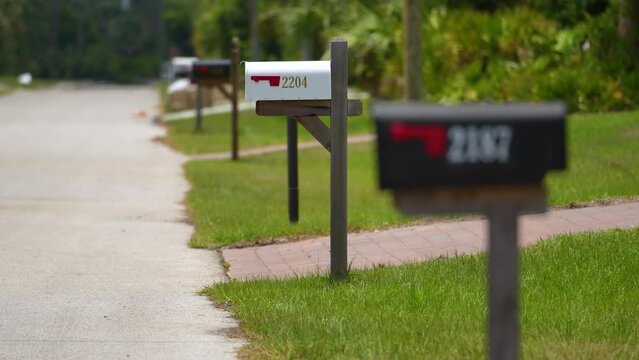 Typical American outdoors mail box on suburban street side
