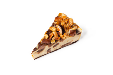 Slice of cheesecake caramel with peanuts and cookies top view on white or invisible background isolated