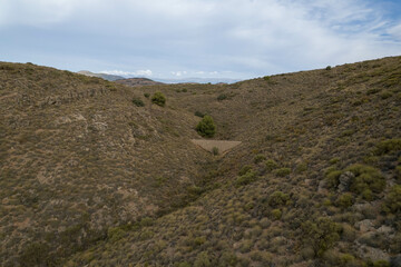 Fototapeta na wymiar A ravine between the mountains in the south of Granada