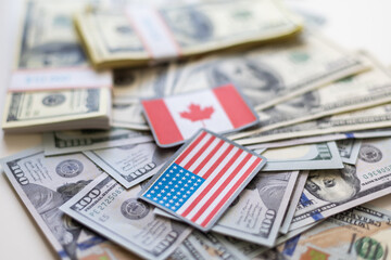us and canadian flag on a us dollar background