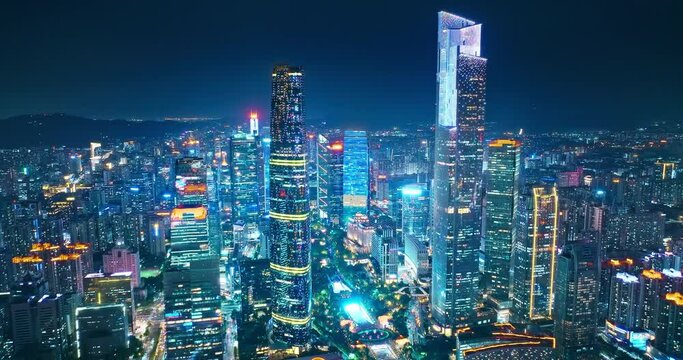 Aerial view of Guangzhou city financial district skyline at night. Removed building trademark and advertising