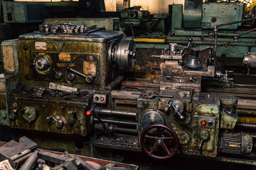 Fototapeta premium Old equipment, machines, tools in a rustic style in an abandoned mechanical factory