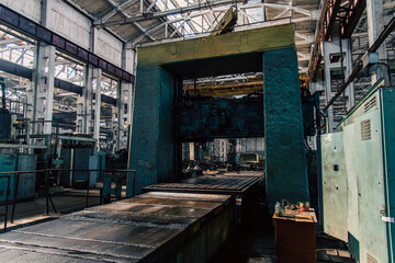 Old equipment, machines, tools in a rustic style in an abandoned mechanical factory