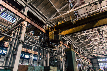 Old equipment, machines, tools in a rustic style in an abandoned mechanical factory