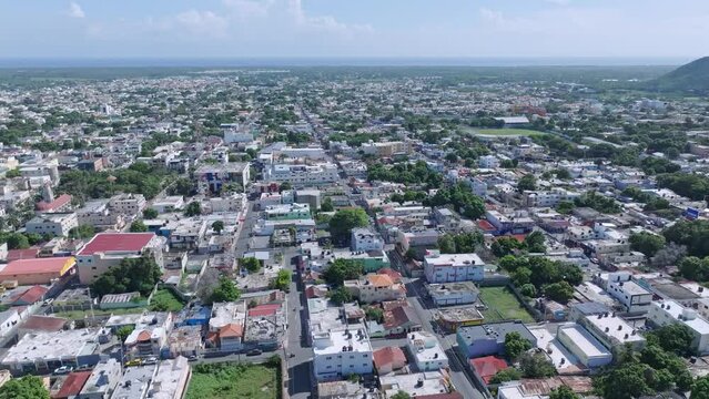 Cityscape of Bani or Ban&iacute; in Peravia Province, Dominican Republic. Aerial orbiting