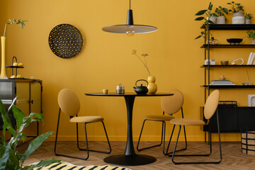 Design composition of dinning room interior with black round table, stylish chair, yellow wall, black rack, lemon, patterned carpet and personal accessories. Home decor. Template.