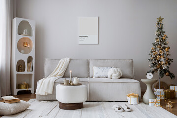 Domestic and cozy christmas living room interior with corduroy sofa, white shelf, mock up poster...
