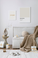 Christmas cozy living room interior with beige sofa, boucle armchair, christmas decoration, mock up...