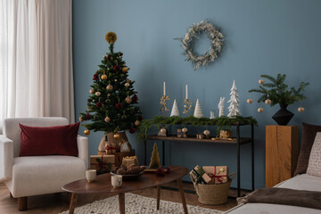 Christmas composition in the living room interior with beautiful decoration,  white armchair,...