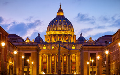 Vatican City (Holy See. Rome, Italy. Dome of St. Peters Basil cathedral at Saint Peter's Square. Evening sunset, golden hour with evening sky and street lamps. - obrazy, fototapety, plakaty