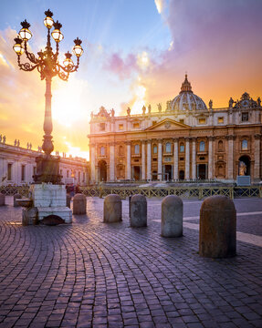 Fototapeta Vatican City Holy( See. Rome, Italy. Dome of St. Peters Basil cathedral at Saint Square. Evening sunset, golden hour with evening sky and street lamps