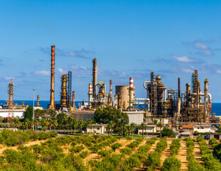 oil refinery facroty, recycle of oil and petroleum in green outdoor nature