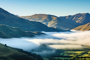 mist rising over a tranquil mountain valley
