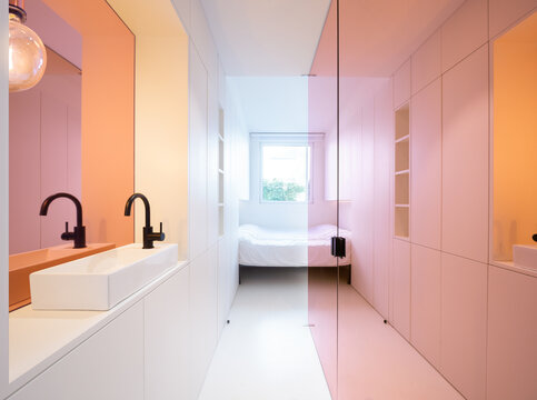Gradient-walled bathroom with dual sinks