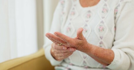 Hands, pain and arthritis with an old woman in her nursing home, struggling with a medical injury...