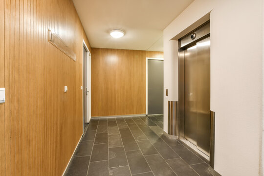 Empty hallway with elevator in building