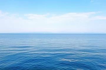 Foto auf Alu-Dibond shot of a calm sea with horizon and wind turbines © altitudevisual