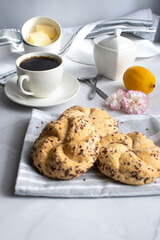 Breakfast with fresh rolls and coffee. on a white background. Morning
