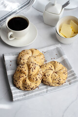 Breakfast with fresh rolls and coffee. on a white background. Morning