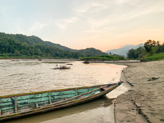 wooden boat on the river