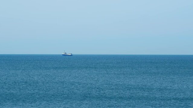 Fishing Boat Trawler Ship Sailing On Sea. Fishing Boat Sailed From The Coast. Real time.