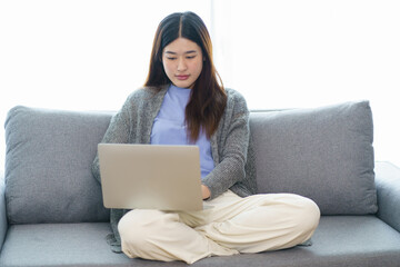 Happy beautiful Asian Woman. Business woman working from home wi