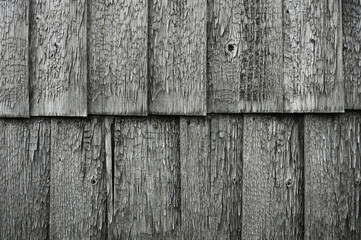 Gray wooden wall close up