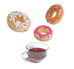 Colorful fresh donuts fly over a cup of tea. Sweet pastries from the bakery, confectionery cafe and colorful glazed donuts. 3d donuts isolated on a white background