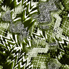 Seamless abstract African pattern with snake skin, stripes, dots. White, black pattern on a green background. - 663818778