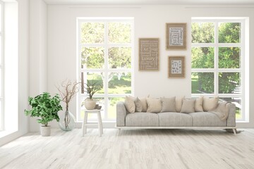 Bright interior design with modern furniture and summer landscape in window. 3D illustration