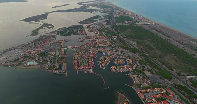 Drone view of the Leucate tourist spot on the Mediterranean Sea, southern France, in summer, during the height of the tourist season. A place for families with children