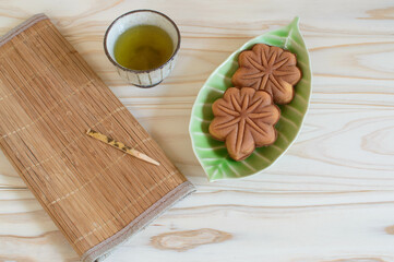 Momiji Manju are sweet cakes traditionally filled with red bean paste baked in the shape of a maple leaf. They are a local food of Hiroshima.