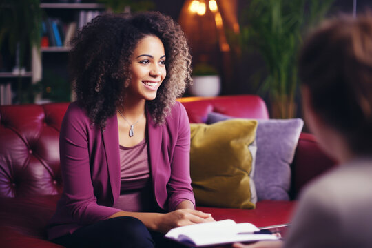 A female afro-american psychologist talking to patient
