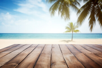 Wooden table top on blurred tropical beach background - can be used for display or montage your products. Background layout