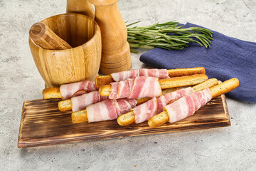 Crispy grissini italian bread with bacon