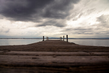 play of lights with the clouds over the Albufera pier