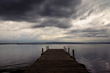 play of lights with the clouds over the Albufera pier