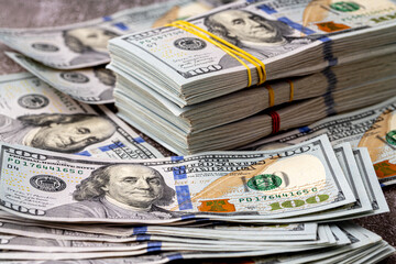 Money, US dollar bills background. Money scattered on the desk. - obrazy, fototapety, plakaty