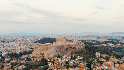 Fototapeta na wymiar Athens, Greece. Acropolis of Athens in the early morning. Cloudy weather. Summer, Aerial View