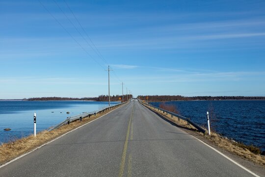 Coastal road on the island of Raippaluoto in spring, Vaasa, Finland.