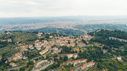Florence, Italy. Fiesole is a city in the Tuscany region, in the province of Florence. The city of Florence in the background of the panorama, Aerial View