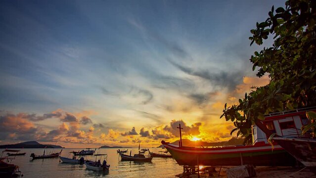 Time lapse stunning clouds float above fishing boats in sunrise..scenery The beauty of the sky was mesmerizing in stunning sunrise.Gradient color..Sky texture, abstract nature background.