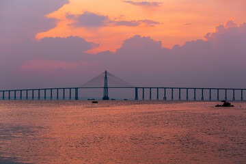 Fototapeta na wymiar Sunset at the Rio Negro bridge in Manaus, Amazonas