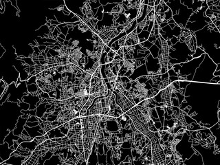 Vector road map of the city of  Iizuka in Japan with white roads on a black background.