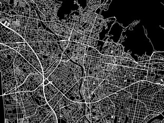 Vector road map of the city of  Kofu in Japan with white roads on a black background.