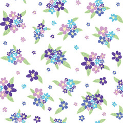 Floral seamless pattern with titian, lavender, blue, purple chamomile flower and leaves on pastel background