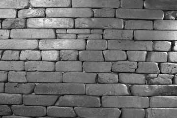 Brick wall texture. House wall pattern black and white photo, close view